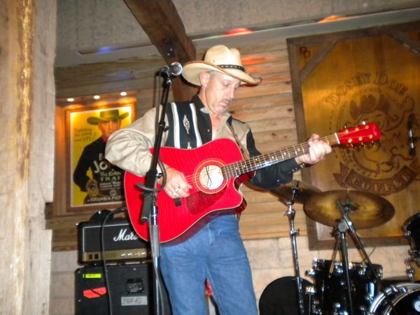 Chet Daniels has been playing guitar since he was five years old. He is an accomplished guitar player and has played professionally around the Houston area since he was in junior high school. He's played several styles of music and performed on the road in various rock & roll bands as well as shows in Vegas. Over the last 25 plus years, he has been playing in country bands around the Houston area and has played for various acts such as Freddy Fender, Johnny Bush & many others. Chet is a very good harmonica player as well and adds the blues & classic rock to the group. He continues to be a session player at the well known Sugar Hills Studio in Houston. His versatile guitar playing allows us to rock out when needed or play that country dancehall sound that we're known for. Liz & Chet have worked together in various bands, duos, etc for over 20 years. He is also a gifted songwriter and has recorded two cd's along the country blues line. For more info on Chet's music go to www.chetdaniels.com