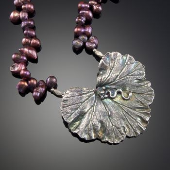 Frosty Geranium - Fine silver big geranium leaf that shows all the nuances of the original leaf. Necklace of fresh water pearls.McKenzie's Jewelry by Nancy Koehler. SOLD