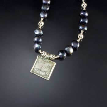 Pearly Lotus - original art work in fine silver with black peacock pearls.McKenzie's Jewelry by Nancy Koehler.Sold