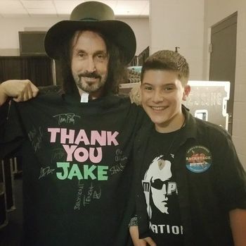 Jake with Mike Campbell, founding member and lead guitarist for Tom Petty and the Heartbreakers, backstage at Prudential Center.