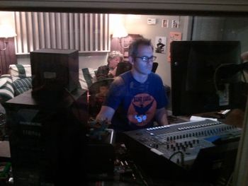 3 Elliott Studio Control Room, Athens, OH Engineer Josh hard at work while Michael expirements with guitar riffs on the couch