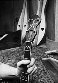 Paul Adams close up making a banjo