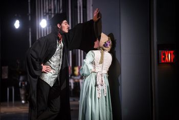 Christopher Cartmill's production of Goethe's Faust — Student and Serving Girl Goethe's FAUST directed by Christopher Cartmill, set design by Bo Ra Kwan, costumes by Sarah Zinn and lighting design by Catherine Cusick — pictured Student (Matisse Neal)and Serving Girl (Kristine Amarante) photo by Matt Pilsner