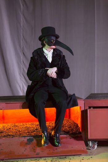 Christopher Cartmill's production of August Strindberg's A DREAM PLAY (The Quarantine) Tennessee Westmoreland (the Quarantine Master) in August Strindberg's A DREAM PLAY, directed by Christopher Cartmill with sets by Claudia Barragan, lights by Casandra Zeugin & costumes by Sarah Zinn (photo by Matt Pilsner).