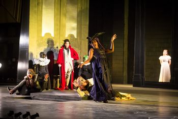 Christopher Cartmill's production of Goethe's Faust — Entrance of a Witch Goethe's FAUST directed by Christopher Cartmill, set design by Bo Ra Kwan, costumes by Sarah Zinn and lighting design by Catherine Cusick — pictured Second Witch (Tshiwela Nematswerani) photo by Matt Pilsner