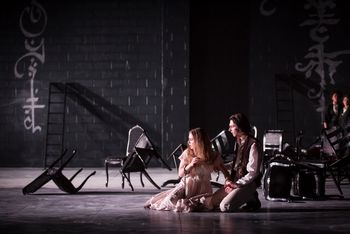 Christopher Cartmill's production of Goethe's Faust — Chained Goethe's FAUST directed by Christopher Cartmill, set design by Bo Ra Kwan, costumes by Sarah Zinn and lighting design by Catherine Cusick — pictured Gretchen (Magali Trench) and Faust (Graham Poore) photo by Matt Pilsner