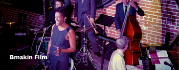 Ayo Awosika, vocalist and band leader, is featured in Bmakin Film: JazzTown, and Who Killed Jazz, directed by Ben Makinen.