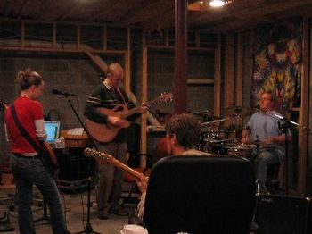 <a href='http://ats.juliecorbalis.com/audio/JULES_AND_THE-Hurricane.m3u'title='Click here to listen!'>Hard at work...practicing for Sunset House!</a>