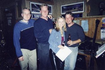 Early Jules and the Family photo op. I don't know what's worse: that toothy grin or those leather pants!