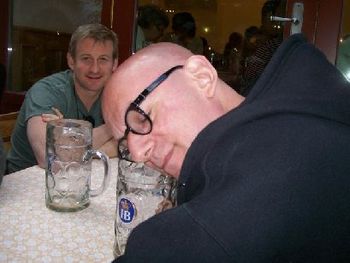 Resting my tired head on the 1-liter mug of beer I'd just downed (That's Johnnie Rodgers, one of Liza's singer/dancers, having a chuckle to my left) - Munich, Germany 7/21/08