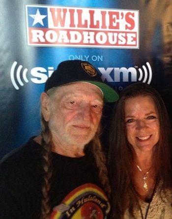 September 21, 2013. Willie Nelson and Carlene. "I went to do Farm Aid and I went on the bus to hug his neck and he saw me and he said: 'Oh my God, you look just like your daddy and your momma,' and then he started to cry." (Thank you Jeremy Tepper for the photo!)