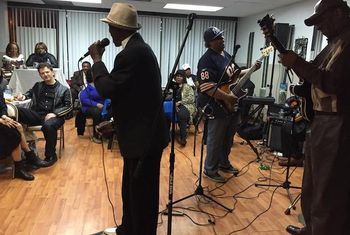 Larry_Sings_Crowd_GOOD_Ashunti_TRTB_April_3_SMALLER Larry wows the crowd with Ice mike and Killer Ray at April 3 2016 fundraiser for TRTB movie, Ashunti community center