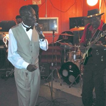 GrownMannLarry_2014_9_copy1 Larry sings on the South Side with Grown Mann, 2014. Both played in A.C. Reed's band in the late 1990s.
