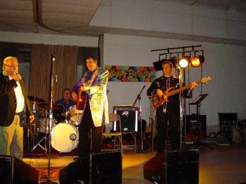 Lynn Beckman Singing "Folsom Prison Blues," Billy's Favorite. Pictured: Lynn (l); Richard 'Stix' Stickley, Drums; Billy Walker; and Charlie Lilly, Super Bassman and Trio Harmony Singer in The Tennesse