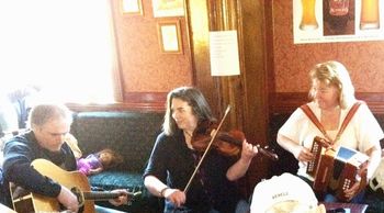 The ladies seem intrigued with the singer. The doll on the bench, not so much! The Playwright, Hamden