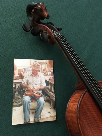 Greg's fiddle An Arthur Connor ram's-head fiddle with photo of the master himself making it.