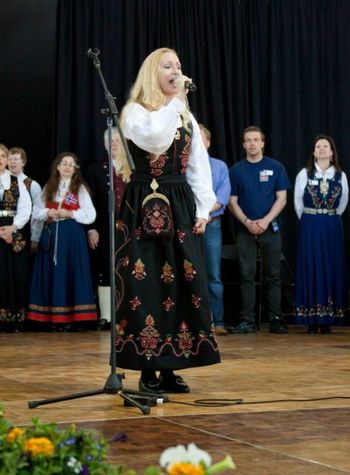 Kicking off Norway Day Festival 2013 ...singing both the Norwegian and the American national anthems.