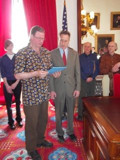 Derrik Jordan and VT governor Peter Shumlin Derrik reads the proclamation "Year of the Vermont Composer" in the statehouse in Montpelier, VT