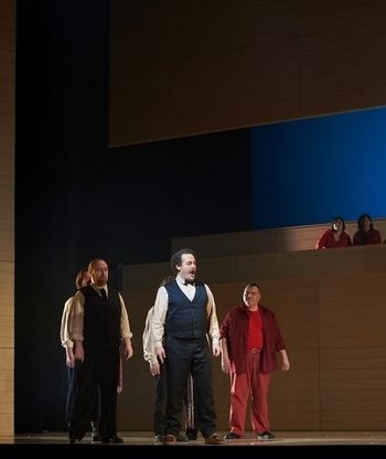 (Foreground) As Delorme, with Russell Braun and Everett Morrison in Louis Riel (COC, 2017)/ (À l'avant-plan) Dans le rôle de Delorme, avec Russell Braun et Everett Morrison dans Louis Riel (COC, 2017) - photo by/de Michael Cooper.