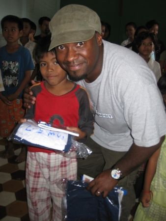 Presenting a kid with a school uniform. For more on my trip check out www.proverbnewsome.blogspot.c