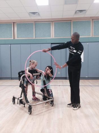 Dancing with a prop MOVE Performance with the Ellen Sinopoli Dance Company at the Center for Disabilities Langen School 3 of 7
