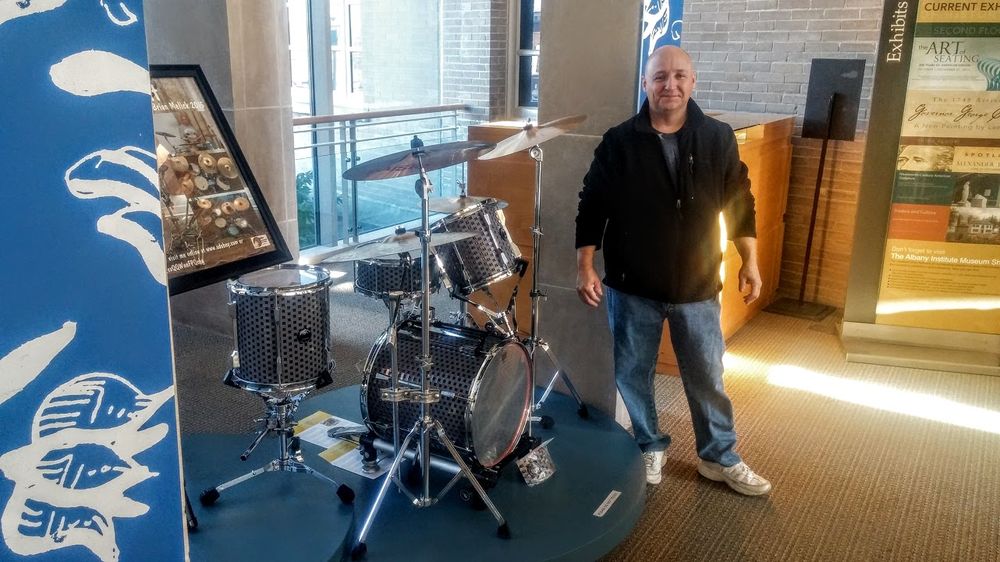 Me next to my Lego Drum Set exhibit