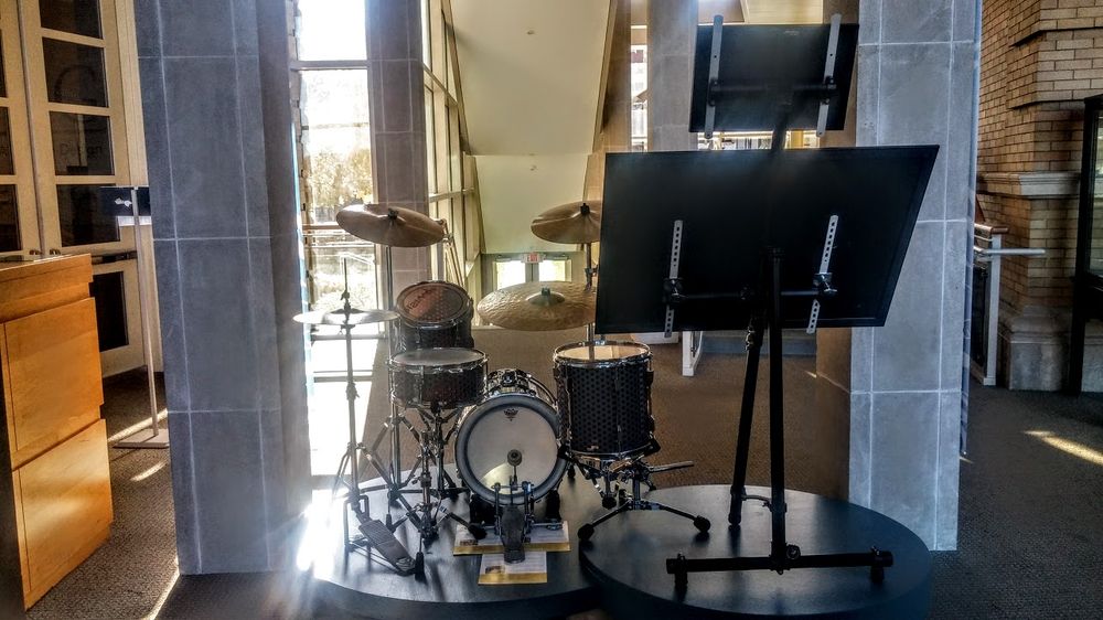 Lego Drum Set exhibited for a 2 month run 11/2016 - 1/2017 Center Stage at the top of the Main Stair Case from Main Entry. Every visitor passed by and got to view it up close! View of Lego Drum Set pointed right at the Main Entry.