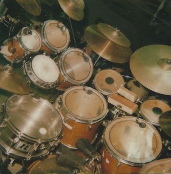 Birdseye view of my very first real PRO Kit. Purchased it after my Hi School Graduation in 1981 Slingerland Magnum Force Kit Mahogany Finish with a 14 x 7 Rodgers Dyna Sonic. Dig the Synare!!!