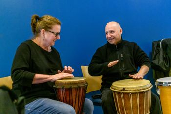 with Maria Zemantaiuski while I was facilitating a casual opportunity for students at the Hudson Valley Community College to simply stop by for about an hour or so to just play drums and smile a lot while doing it - in support of their Cultural Affairs & Health and Wellness offices
