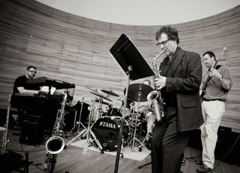 Open Interest. From left: flute, me, tenor sax, music stand, huge cymbal, Terry's head, John, Craig.