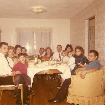Holiday Family Gathering-II From what I remember, this picture was taken at my grandparents 2nd home on Long Island, while they still had their apartment in Harlem, where my grandmother had her own little business; while my parents, sister, and me, lived in New Jersey at the time...