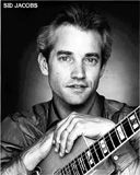 Young Sid Jacobs Sid when I first met him. Oh, my goodness! With the premature grey hair and the baby blues he drove the girls wild!