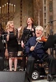 An incredible experience getting to share the stage with violinist Itzhak Perlman in a concert at the historic Temple Emanu-El in NYC in honor of the 75th anniversary of the liberation of the Auschwitz concentration camp. (Pictured with us is actress/singer, Joanne Borts)