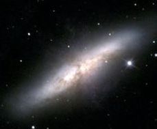 This is the view of M82 you would see through a telescope.