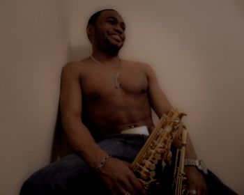 Candid-Alto-Saxophone-Soprano-Saxophone-Tyrone-Smith-Music-Producer-Shirtless-Russell-Simmons-Jewerl