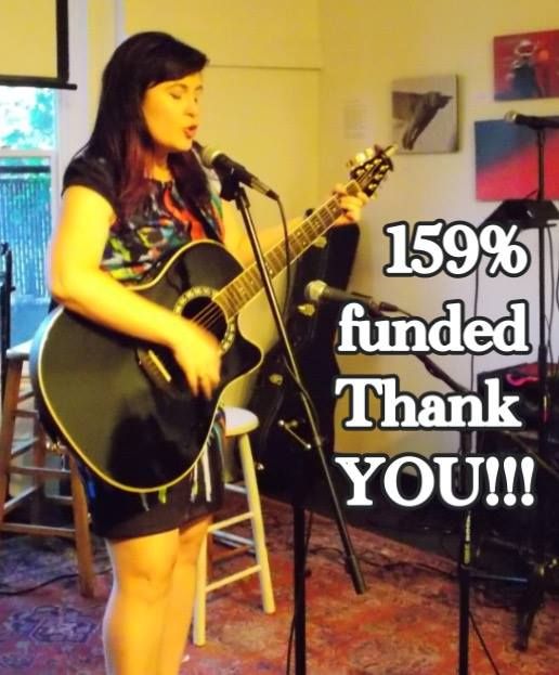159% funded text over Lauren playing guitar
