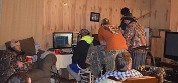 DSC_0026 Scott, Leighton, Hal and Curt reviewing footage while Kyle Wilson and Randy Huffman relax at the camp.