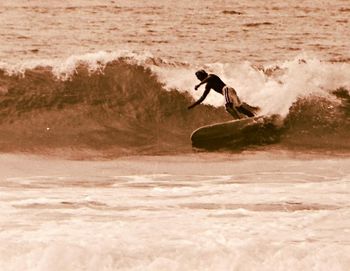 now this is a really good shot of Greg!! Greg Alach burying the rail....this photo also gives you a good look at the boards we were surfing on now...shorter..thinner boards!!!