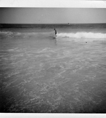 Mikes first wave at Ocean Bch '63 We had a little box brownie photo camera with us...wayne took the photo..beach was totally deserted...just me in the water...when i see that photo i can still remember that pioneering feeling we felt!!..i guess it may have been the same for you in '63!!!