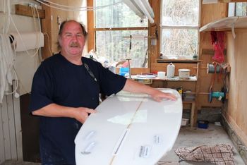 young Colin Lowe at his home/workshop Pataua sth rd Col was one of those great surfers that we all got to punch his face at some time or other...but his face still looks ok for all the pounding...i think his wife was a nurse....no..Col has mended his ways..we luv him! a true northland icon!!
