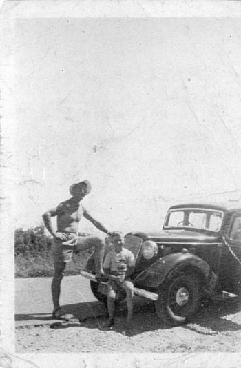 1954 dad and Phil Cooney 10 yr old Phil Cooney..just 5 years away from his first surf experience....like many of you around the country....pretty sure this is at...or on the way to Piha 1954....