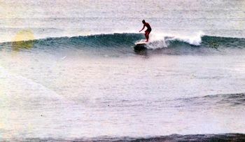 and here's Mike on that perfect high tide peak...Jan '64 was also a great little left used to run off it too at high tide as well!!