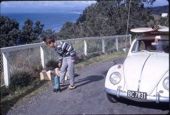 got he's slippers on this time....all the comforts of home!!... tea time again ...overlooking 'Mahia' Peninsula...Neville Ray..autumn of '68 doing one of those awesome surf trips....and Mahia was getting some good press by '68....