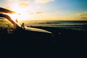 meanwhile ..heaps of us were heading down to that other hot West coast break too!! Sun setting on Richard Langmuirs car ...clean Raglan swell ...Autumn of '73
