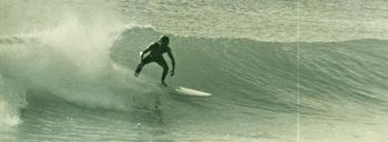 Greg again....speeding down the line at Shippies.... note the slightly longer narrower board that he is riding.....and definitely looking like he getting some real speed up!!....