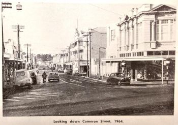 notice the cool old chevy on the right...awesome cars! I mean...this is a weekday in Whangarei (a rural town...not a city yet) in '64...you could just about have a picnic in the middle of the road...couldn't you!!....i remember most NZ country towns were a bit like this in '64
