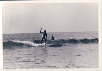 Dick Robinson ...Waipu cove '63 Dick doing a drop knee backhand reverse rail turn kick out re-entry while waving to everyone...Ha!!!