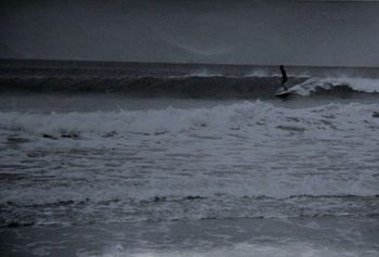 Well Trevor King decided to go out for a surf.... cold wet day...cross wind..lumpy surf....rather just listen to Dylan.....Trev at Waipu.............do you remember those sort of days!!!