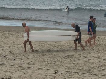 Don and Ross (Edge) hitting the tubes again on their home made early 60s boards....Waipu 2014 ..these guys first started carrying their boards up the beach at Waipu in 1959....amazing!!...