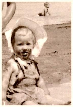 1954 (Jules) Julie Bryan...eating sand at Rawene... Funny to think that this little surf crowd chick would end up 7,000ft up in the Himalayas meditating and doing yoga 20 yrs later ........ahhh..the hippie generation were an adventurous lot.....we all seemed to end up searching for something!!!!